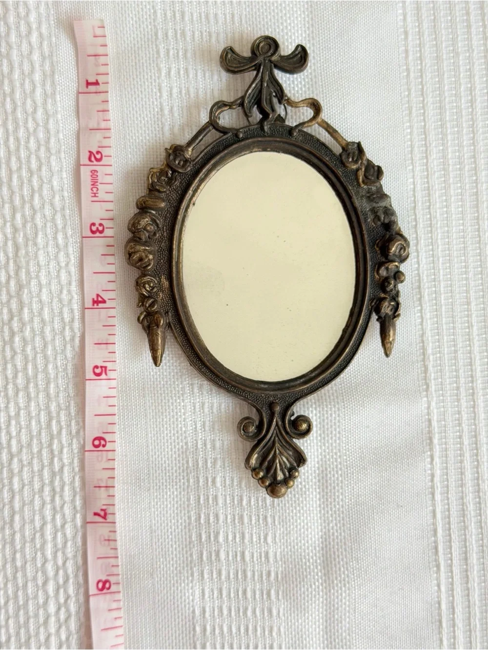 Vintage Made in Italy as stated on the back.  Ornate Wall Mirror